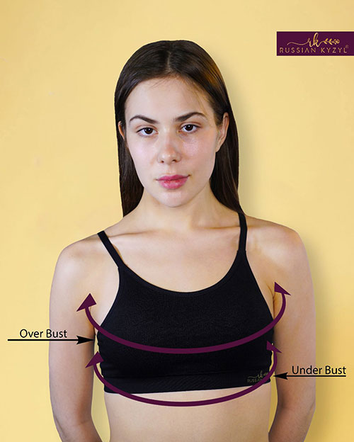 A girl wearing black with a design explaing Overbust & Underbust in Bras